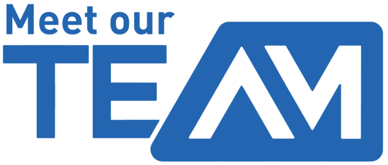 Blue text graphic reads "Meet our Team" with a stylized "AM" in a blue trapezoid, highlighting our team spirit.