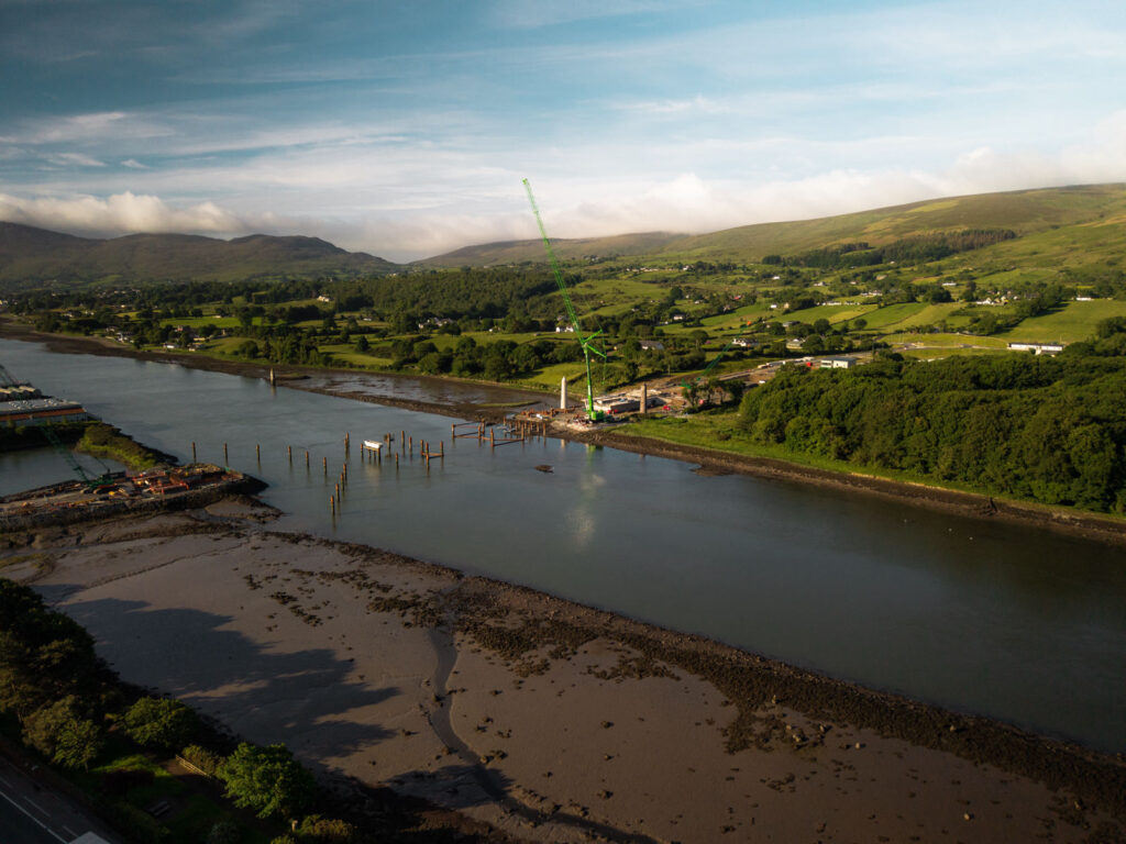 Wide aerial view of the Narrow Water Bridge cross-border construction site on the River Newry between Counties Down and Louth